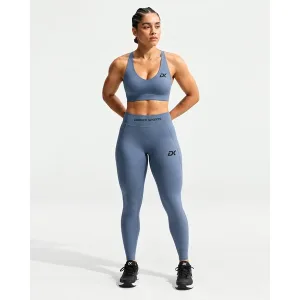 Personalized women’s custom sports bra with vibrant sublimation print for team workouts.